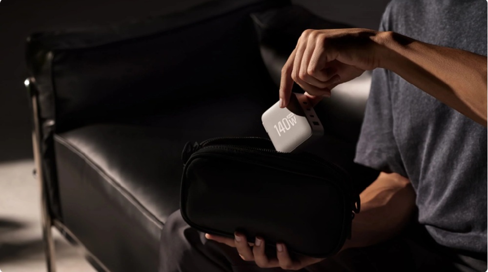 EcoFlow 140W Charger powering laptop and phone